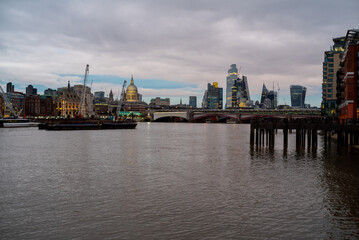 London cityscape at dusk from river thames