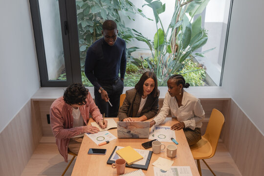 Diverse businesspeople collaborating in office
