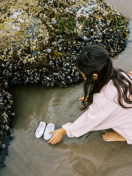 Girl holding shell