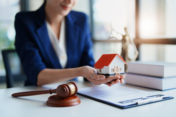 Law, Consultation, Agreement, Contract, Concept Attorney or Lawyer is sitting and accepting complaints from clients for home and land matters in court.