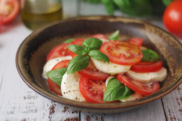 A bowl with traditional Italian caprese salad