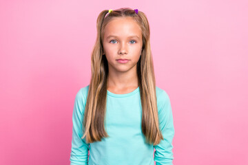 Portrait photo youngster funny preteen cute little schoolgirl wear blue jumper positive long blonde hair nice isolated on pink color background