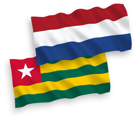 Flags of Togolese Republic and Netherlands on a white background