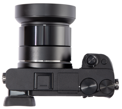 Mirrorless Photo camera isolated. Top view