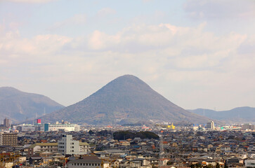 Iinoyama towers over Marugame City. Also known as Sanuki Fuji.