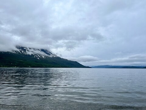 Fjord reflection at the ocean surface, ocean view, mountains
