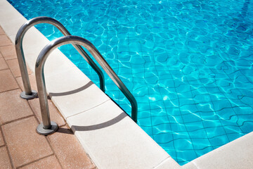 Sunlight reflected in swimming pool, Puglia, Italy