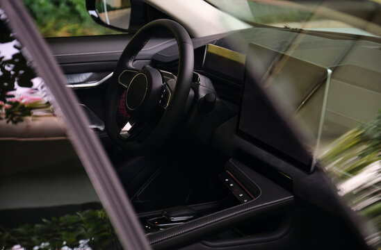 Closeup of new electric energy car steering wheel