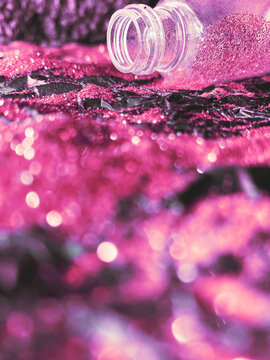 Purple glitter spilled from the bottle for the New Year's decoration.