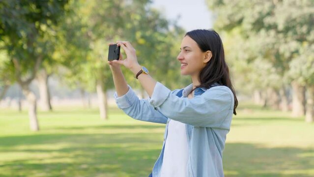 Indian girl clicking pictures