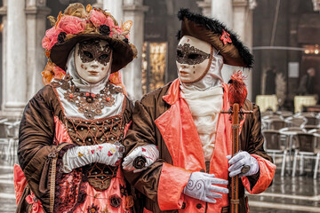 Colorful carnival masks at a traditional festival in Venice, Italy