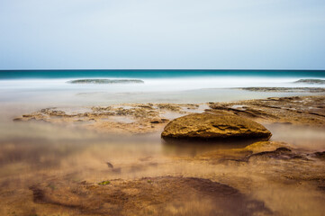 Rock and Ocean In Sydney. Long Exposure. ND filter effect.