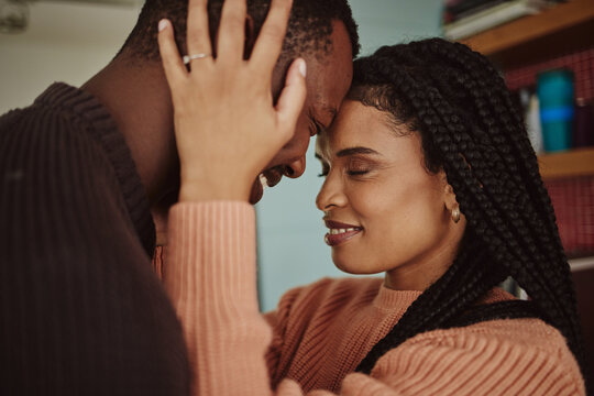 Black Couple, Love And Care While Together For Happiness In A Happy Marriage With Commitment And Care. Young Man And Woman Touching Face Of Head While In A House To Bond, Intimate And Show Commitment