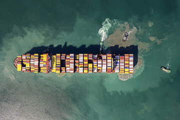 Aerial top view container cargo ship in import export business commercial trade logistic and transportation.