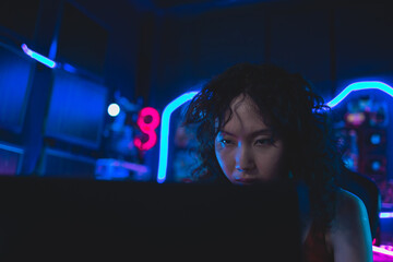 Portrait of Asian Women  programmer, staring confidently into camera