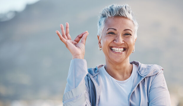 Elderly Woman, Portrait And OK Hand In Nature For Exercise, Training Or Workout Success, Trust And Healthy Lifestyle Promotion. Yes Sign, Happy And Retirement Old Woman For Sports Or Wellness Journey