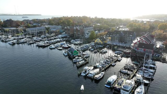 Boat marina with upscale yachts and watercraft in Annapolis Maryland. Aerial view in autumn.