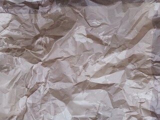 crumpled crumpled light colored rough paper