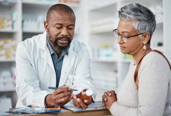 Pharmacy, black man and woman with healthcare medicine and conversation for instructions. Pharmacist, female patient or medical professional talking, stress or explain prescription to senior customer - Powered by Adobe