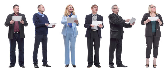 a group of people are holding a tablet and looking to the side