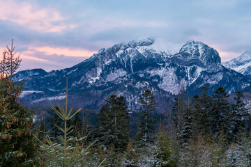 Naklejka na ściany i meble Tatra Mountains winter time. Tatras National Park Poland. Snow-covered winter mountain. Winter landscape in the Tatra Mountain