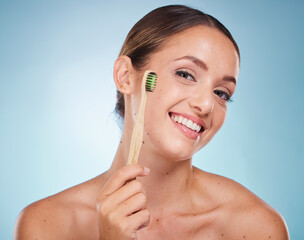 Brushing teeth, dental and woman with toothbrush for teeth whitening and beauty, oral health and fresh breath with studio background. Mouth wellness, Invisalign portrait and clean with bamboo brush.