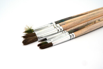 Fototapeta premium Paint brushes on a white background close-up