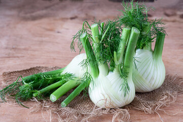 Fresh organic fennel on wooden table  © Vika