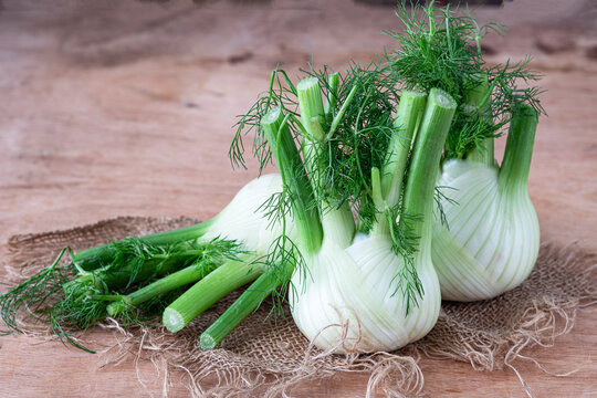 Fresh organic fennel on wooden table	