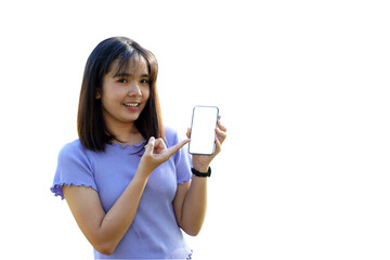 Naklejka premium Smiling Asian woman playing and update new applications. Her hand pointed at the phone with blank screen workspace area chatting on white background. Soft and selective focus.