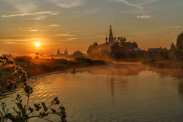Fototapeta na wymiar Sunrise in Dunilovo Annunciation Monastery , Ivanovo region,Russia.