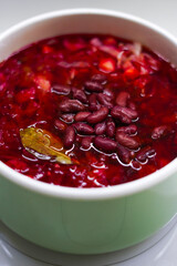 A big nice pan of fresh Ukrainian vegan borscht, close-up