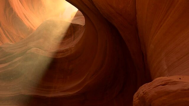 Dramatic shot of Antelope Canyon. Sunlight coming into the cave.