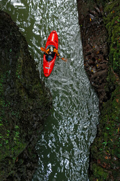 A man Paddles on the Alseseca River  in the Veracruz region of Mexico while scouting for huge whitewater.
