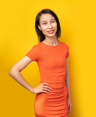Obraz premium smiling woman, happy, skinny woman, fit woman, long hair, beautiful, pretty, mockup, template, curious, eyes, look, yellow background, ad, adorable, attention, background, banner, black hair, blank, b