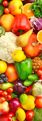 Beautiful background of vegetable and fruit. Vertical photo.