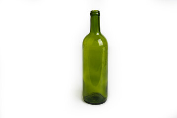 Empty wine green glass bottle on a white background