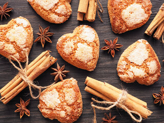 Shortbread cookies, cinnamon hearts on a wooden background.