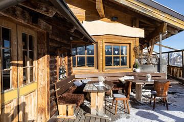 Ski hut with an entrance group and windows on the Alpine ridge, Austria, Salzburg