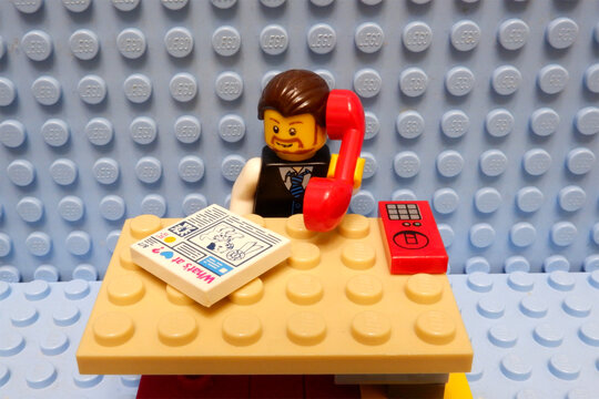 Ryazan, Russia - September 3, 2021: LEGO figurine. The boss sits at his desk