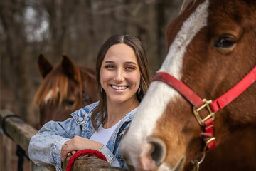 Lovely Brunette Cowgirl Enjoying A Day With Her Horse On Her Farm