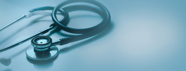 healthcare and medical industry. doctor stethoscope on blue background. banner with copy space