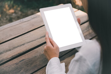 Woman using tablet blank screen mockup for design spec