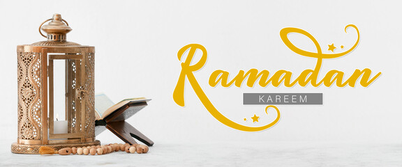 Greeting card for Ramadan with Arabic lantern, prayer beads and Koran on light background