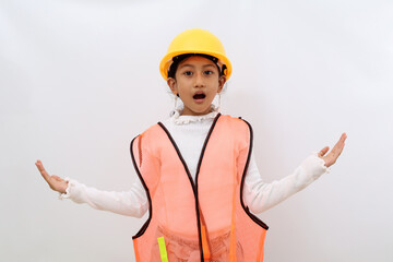Doubtful Asian little girl in the construction helmet as an engineer standing while showing asking gesture. Isolated on white with copyspace