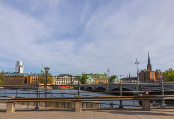Beautiful view of historical center of Stockholm with bridges across river on summer day.