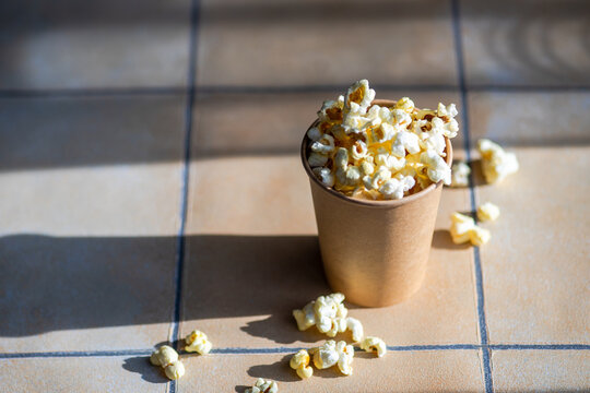 Paper cup with popcorn snack