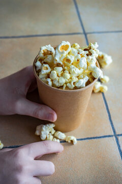 Paper cup with popcorn snack