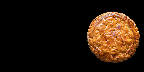 French king cake known as Galette des Rois, in the style of Northern France. Celebrating Epiphany, with a wide background, ideal for customization
