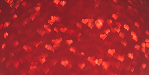 Pattern of red hearts on a purple background.